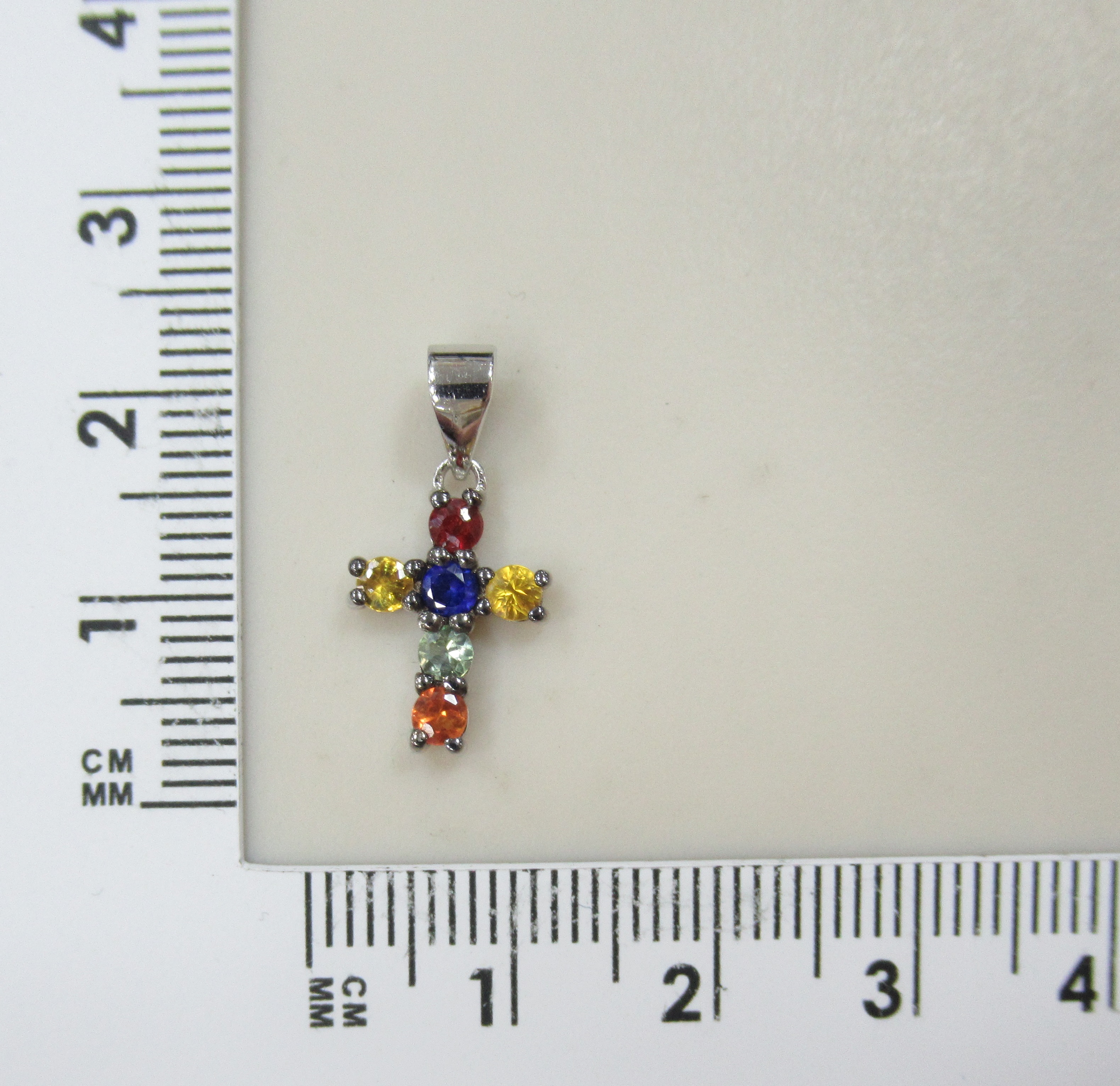 Серебряная подвеска-крест с мультисапфирами